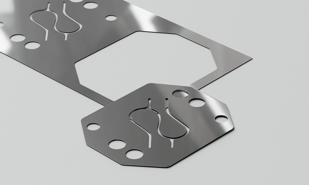 a metal plate with holes