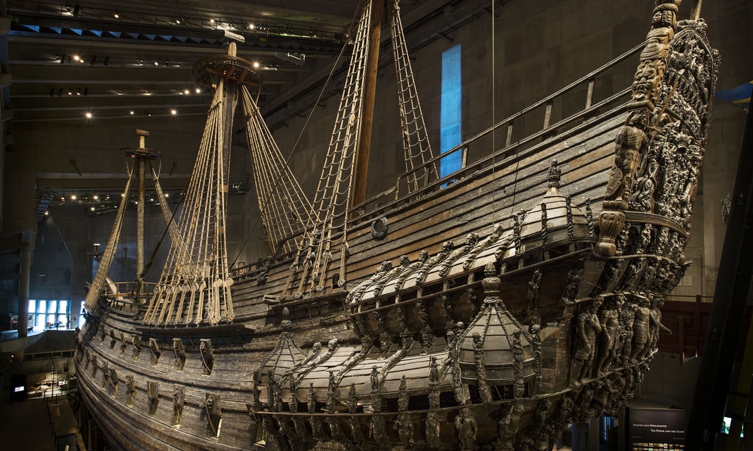 a wooden ship in a museum