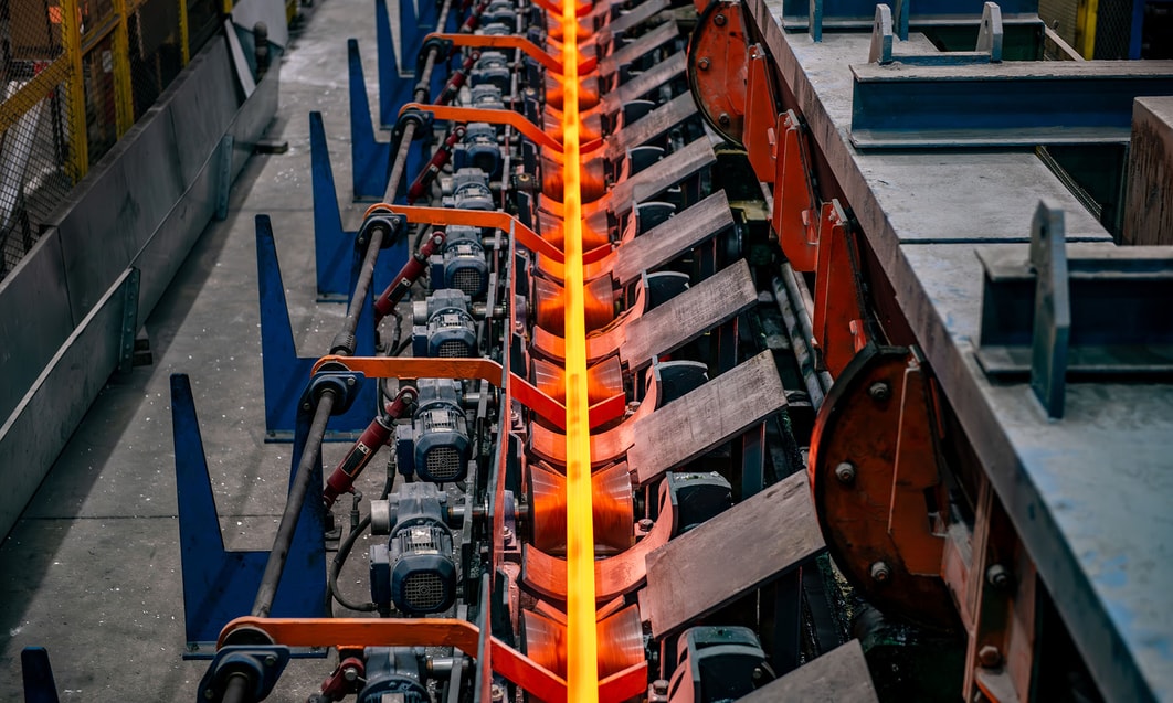 a machine with red hot metal