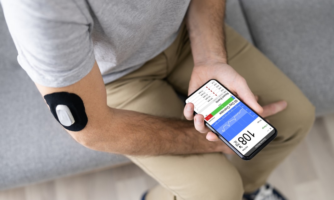 a person holding a device