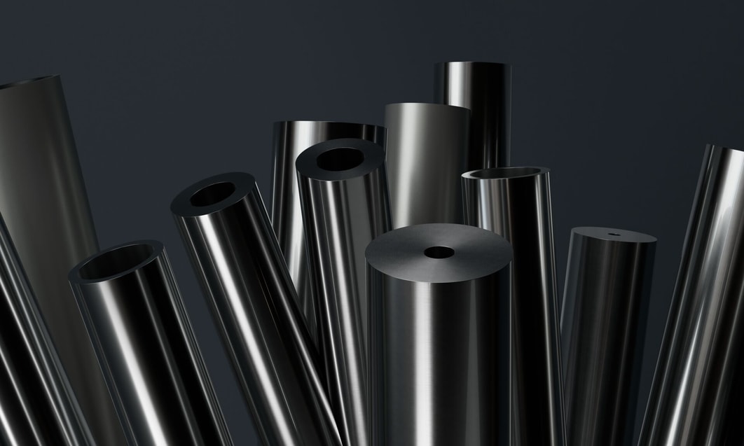 a group of shiny metal tubes