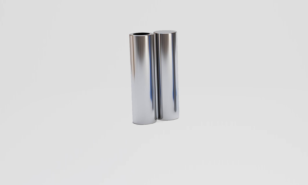 a silver cylindrical object on a white background