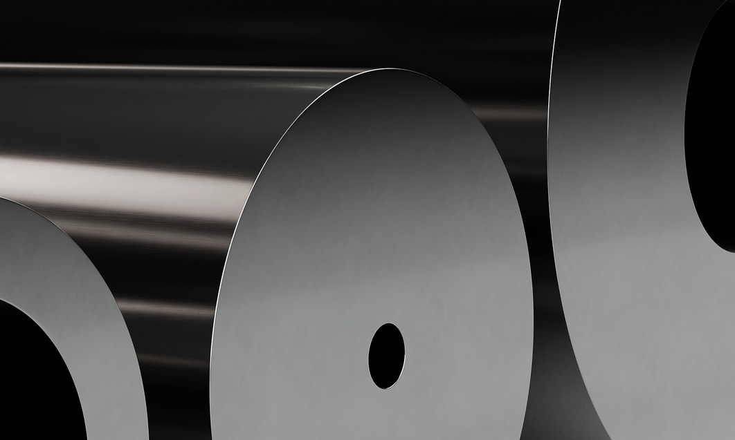 a close-up of rolls of metal