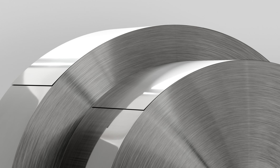 a roll of steel with a white background