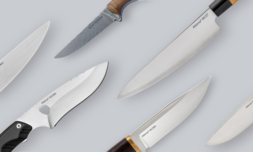 a group of knives with a wooden handle