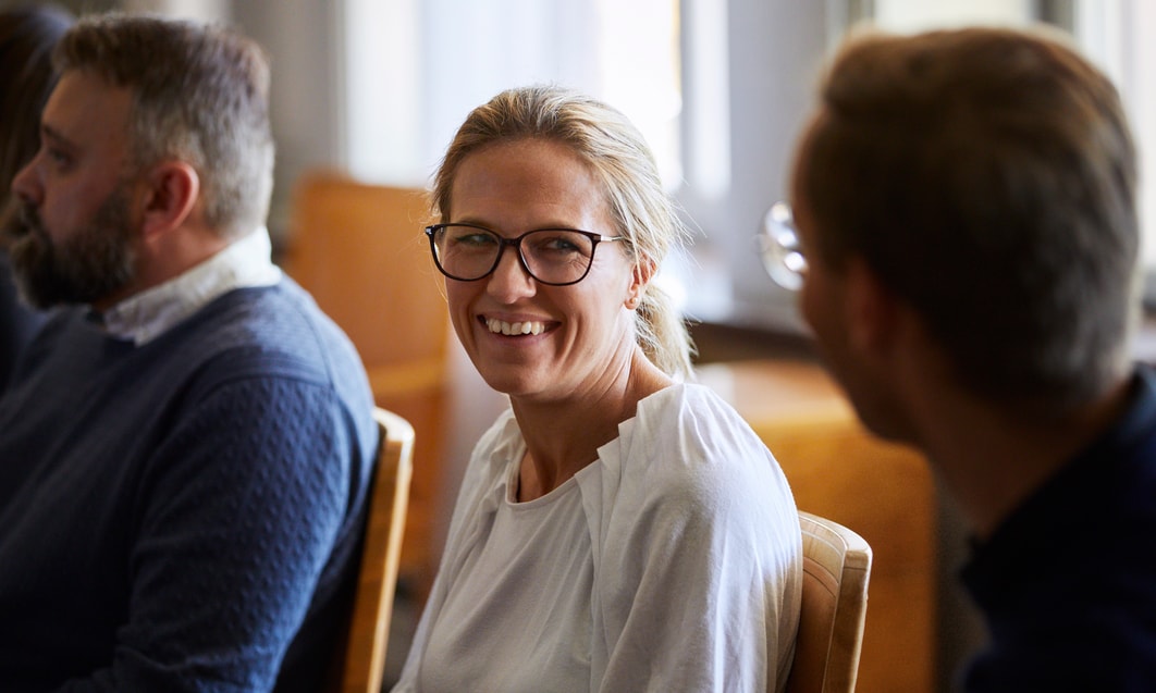 a person smiling at a person