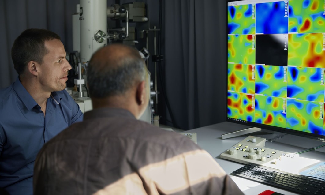 a person looking at a computer screen