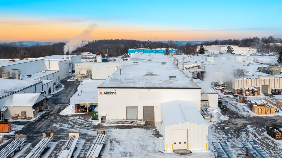a large white building with snow