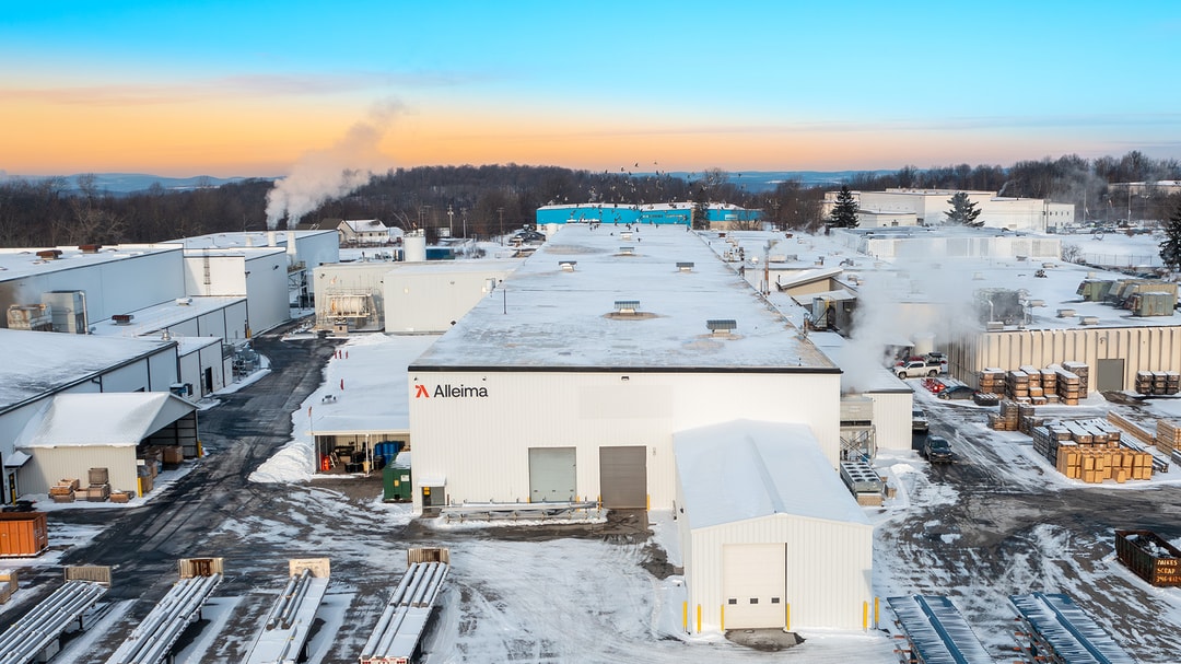 a large white building with snow