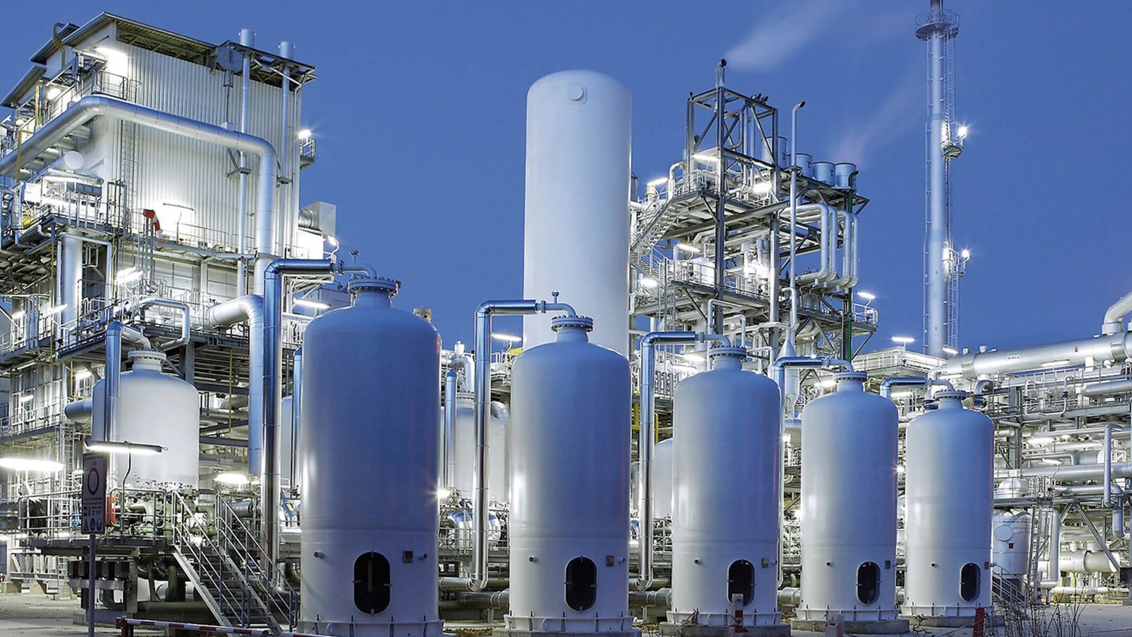 a large white cylindrical tanks