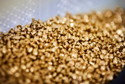 a pile of gold screws