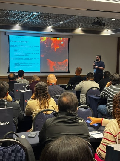 a person standing in front of a large screen with a large screen on it