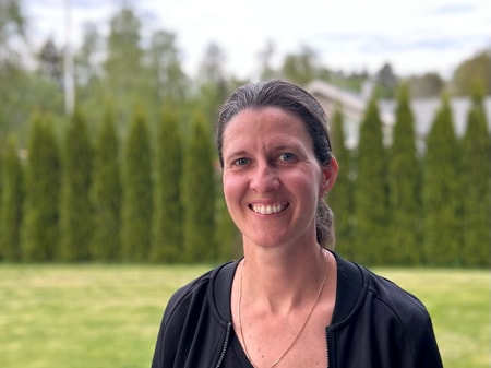 a person smiling at camera