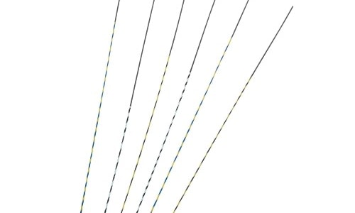 a close-up of several thin black and yellow wires