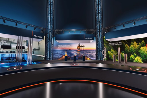 a stage with a large screen
