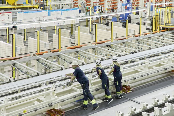 a group of people working in a factory