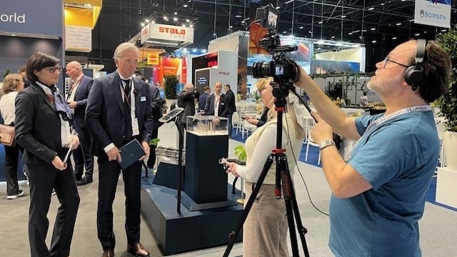 a person standing in front of a camera