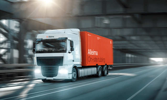 a white truck with red container on the side