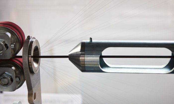 a machine with a long cylindrical object