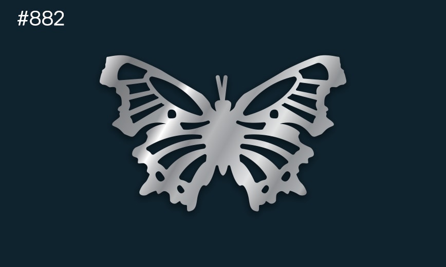 a silver butterfly on a dark background
