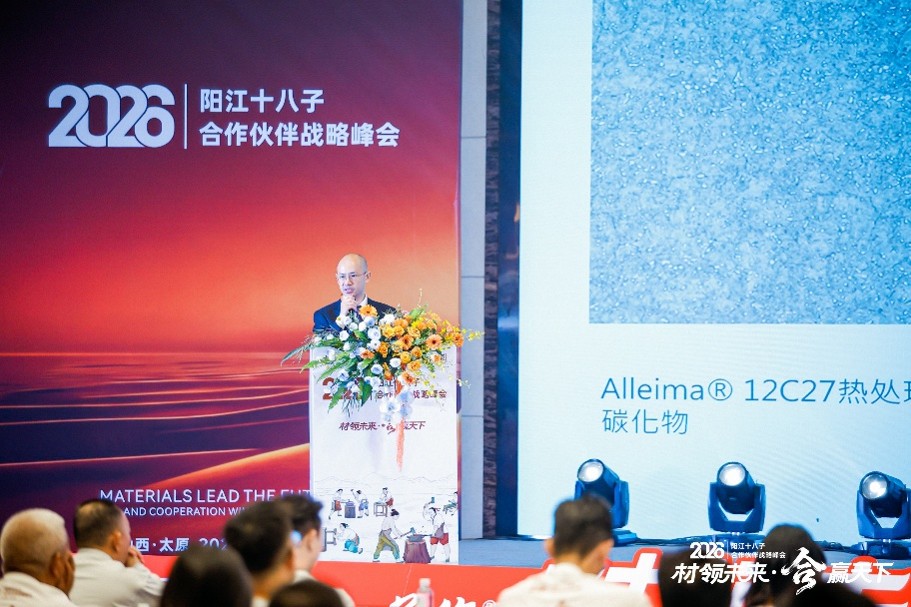 a person standing at a podium with flowers