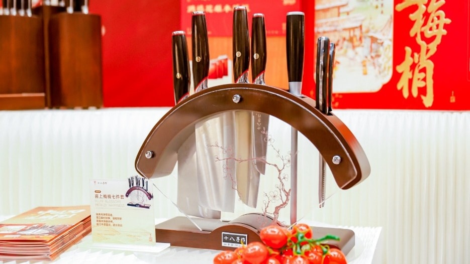 a set of knives on a stand